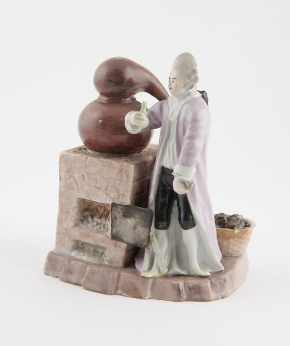 Porcelain figure of an alchemist, possibly Meissen