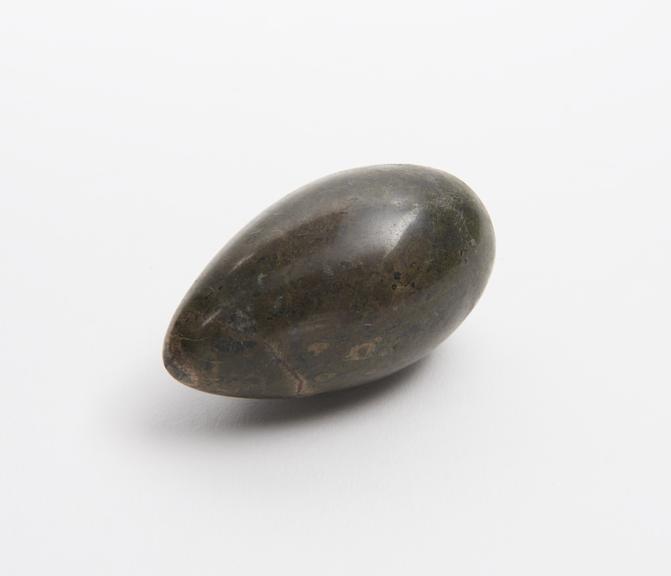 Small egg-shaped pounder, of polished green stone