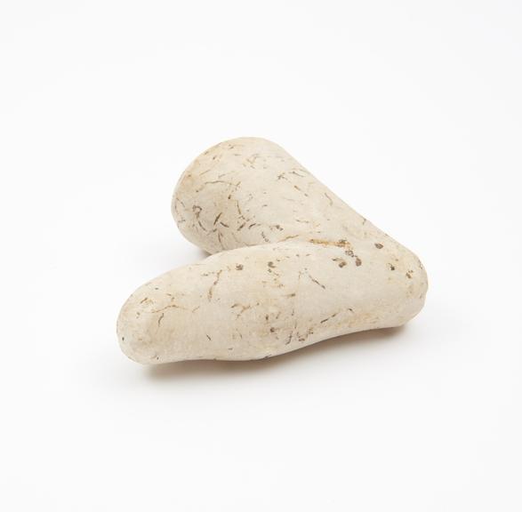 Carved marble pestle in form of a crooked finger, Roman