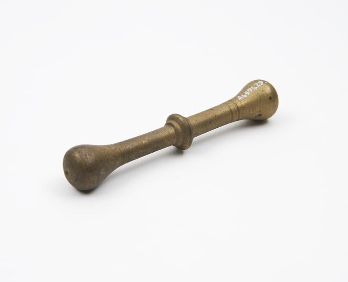 Small brass pestle, European, 1601-1850