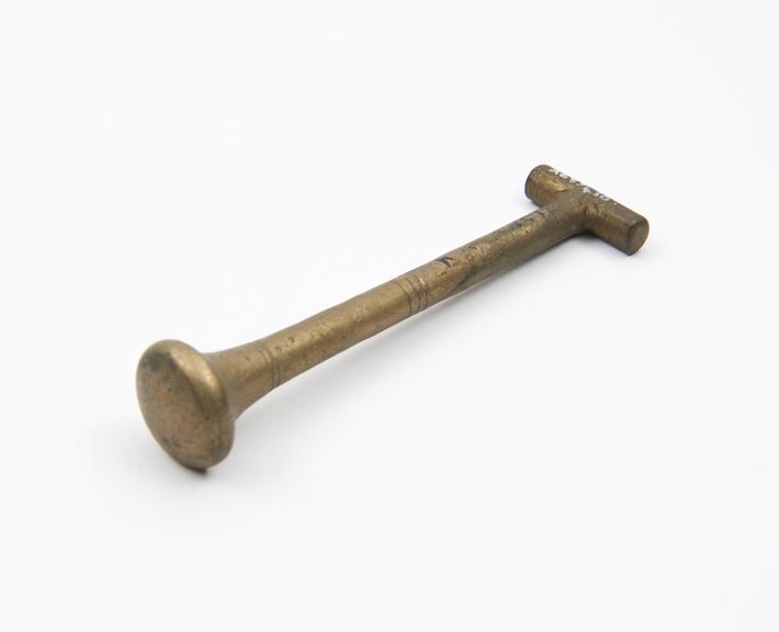 Small brass pestle, European, 1601-1850