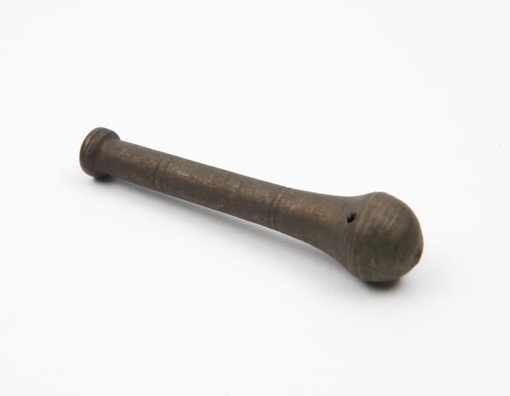 Bronze pestle with bulbous grinding end tapering stem and