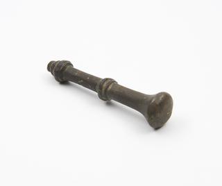 Bronze pestle