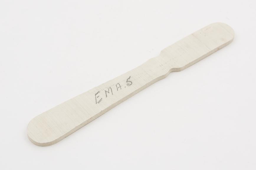 Blank for a toothbrush handle made of cream coloured casein