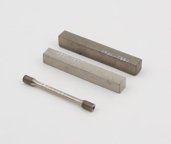 Three titanium rods made of Ti sponge which has been milled and