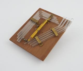 Eight glass tubes from blood transfusion apparatus