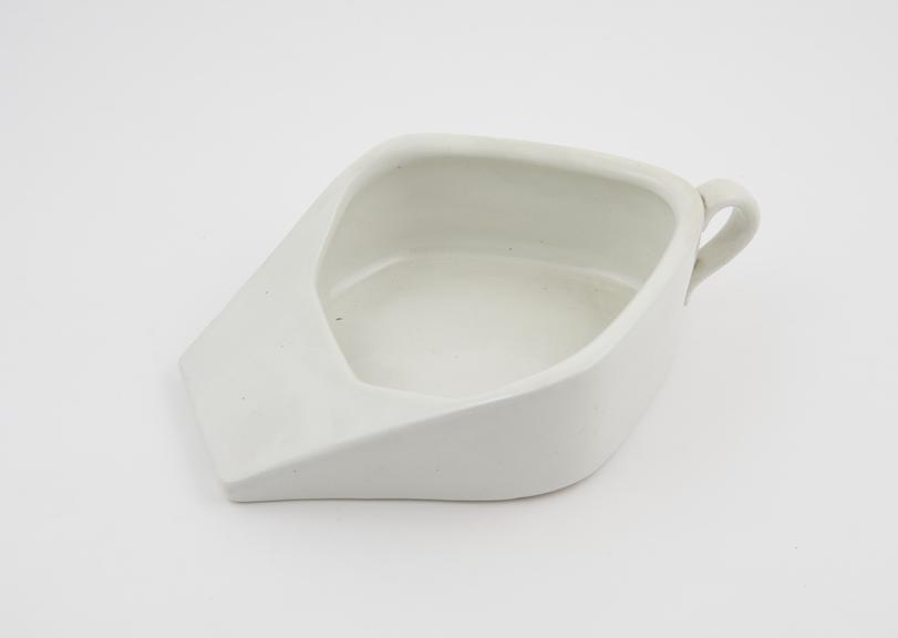 Child's bedpan, glazed earthenware, supplied by Boots Chemists