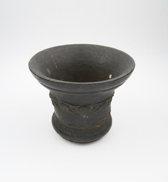 Bell shaped mortar, moulded flaring rim, moulded foot ring