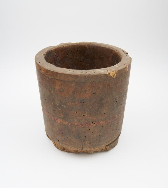 Cylindrical turned wooden mortar