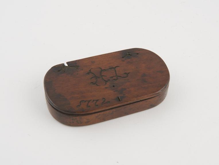 Empty wooden case, varnished, inscribed H.L. 1772