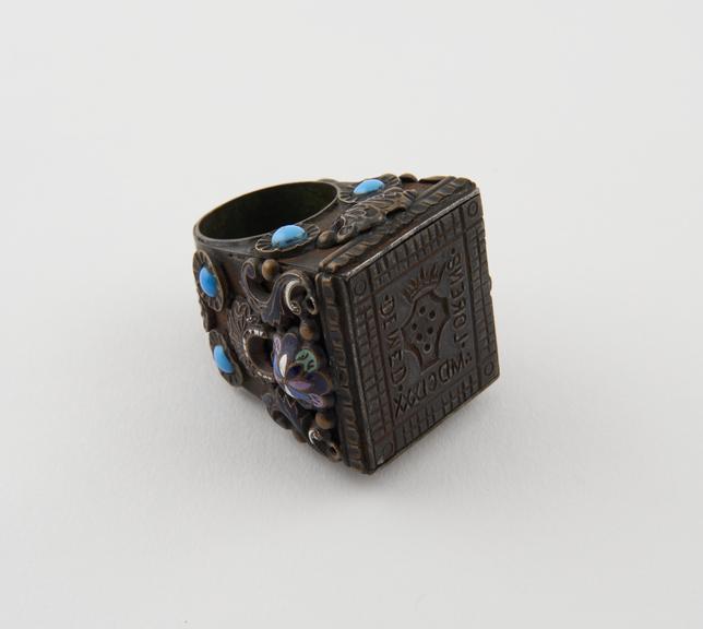 Metal finger ring with receptacle for relics with engraved