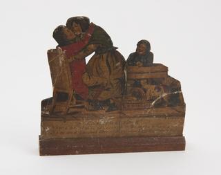 Samuel and Rachel kissing at Christmas time