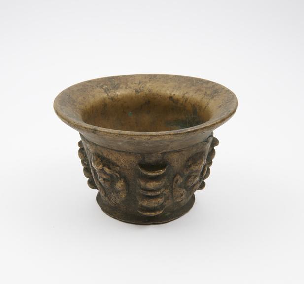 Small squat bronze mortar, deep flared rim