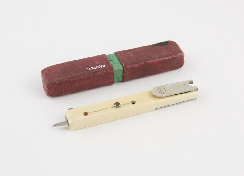 Retractable pen knife, ivory and German silver cased