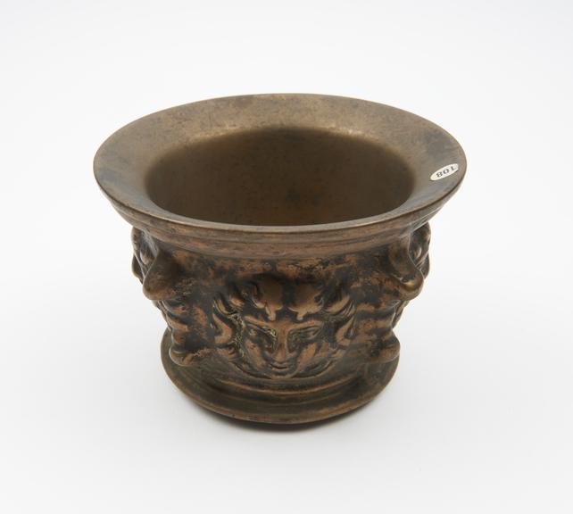 Small bronze mortar, flat base and flared foot, flared rim