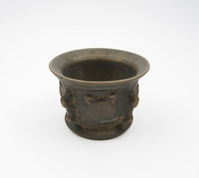 Small bronze mortar, flared and incised rim