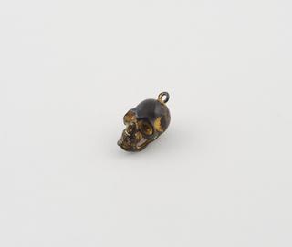 Pendant, silver gilt, human skull shape