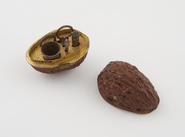 Serving set composed of serving implements inside walnut case