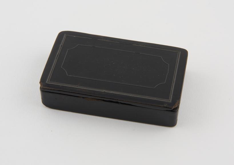 Black papier mache snuff box, rectangular, with hinged lid