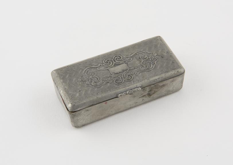 Snuff box, pewter, rectangular, roller hinged lid along length