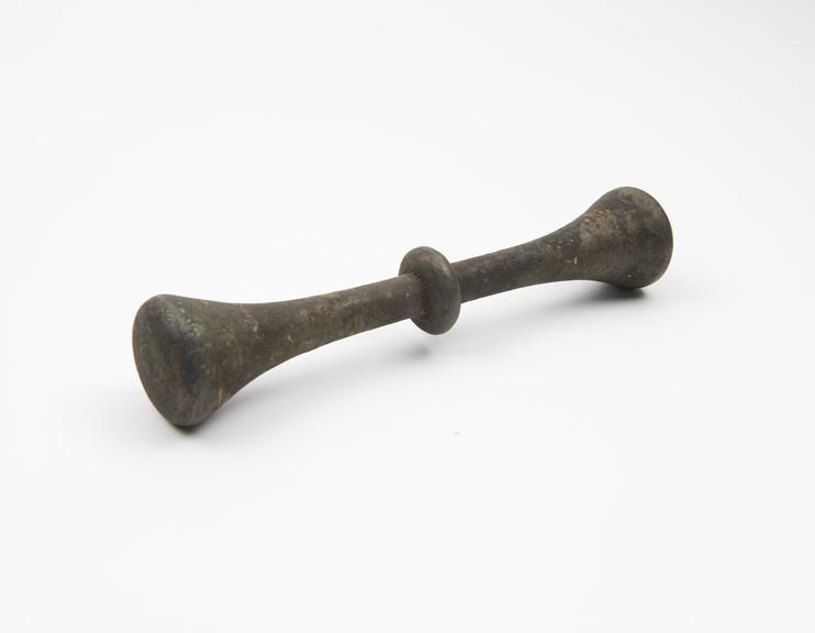 Bronze double-ended pestle, with central flange, Spanish