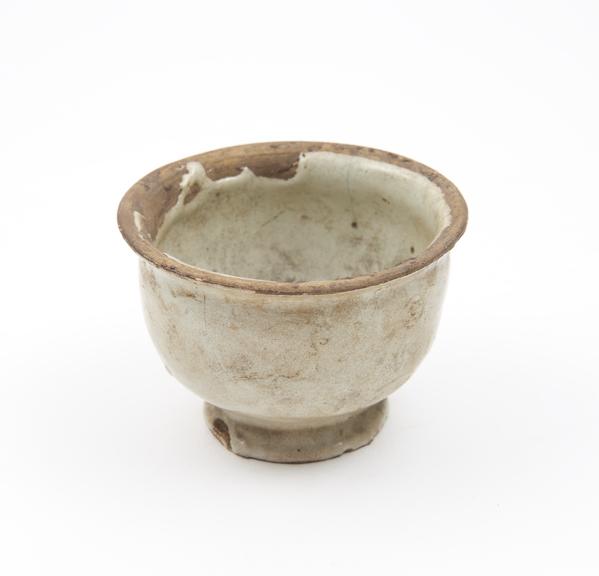 Earthenware dispensing pot, tin-glazed, English, 1650-1730