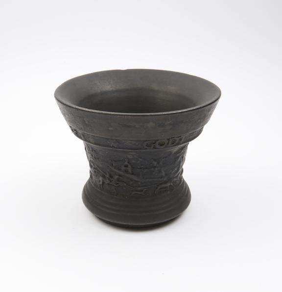 Bell-shaped bronze mortar, everted and moulded rim, flared foot