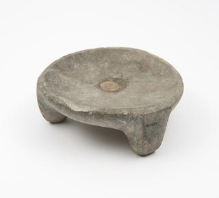 Stone mortar, with three short legs