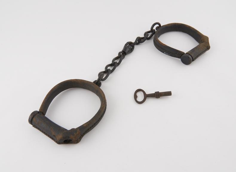 Leg irons, leather padded cuffs, English, 1850-1910