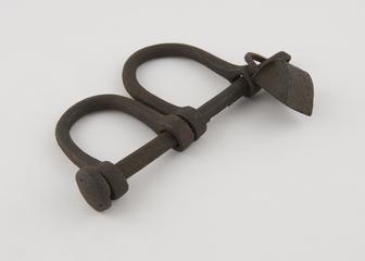 Handcuffs, iron, linked by iron rod, secured by padlock