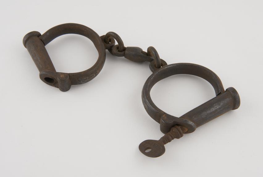 Hand cuffs, iron, by Hiatt, English, 19th century