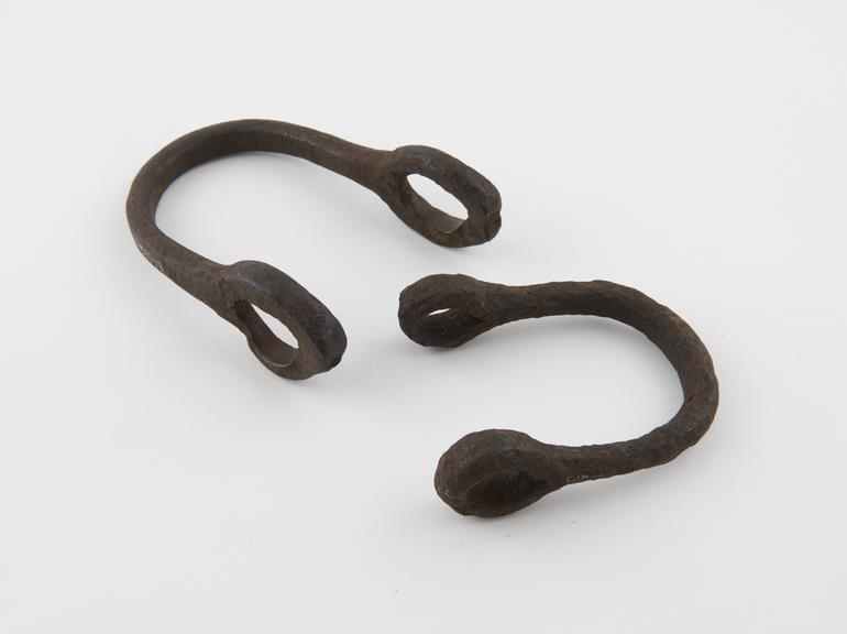 Two odd U-shaped manacles, probably English, 1601-1850