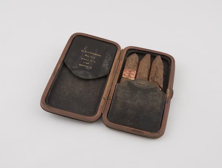 Leather cigar case, containing 3 Havana cigars, presented to Dr