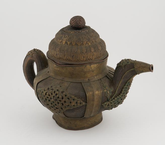 Wooden pot with handle and spout and separate domed lid