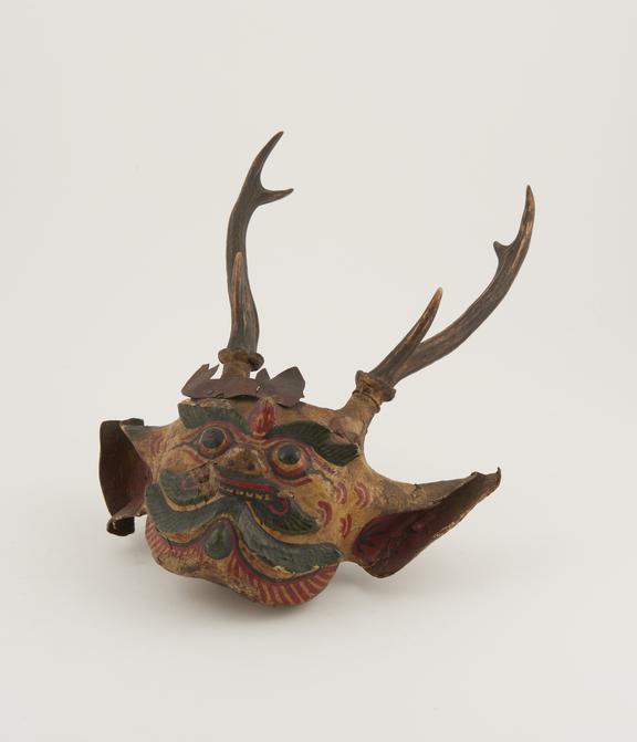 Solid fibre and papier mache(?) devil mask with branching horns