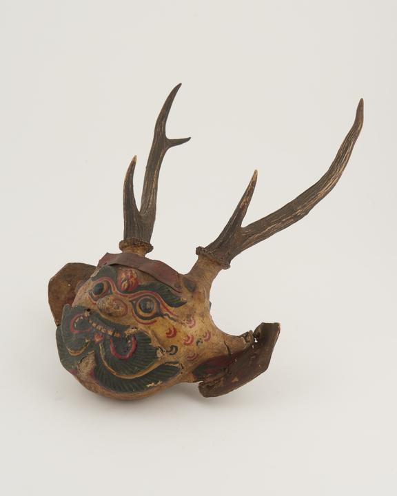 Solid fibre and papier mache(?) devil mask with branching horns