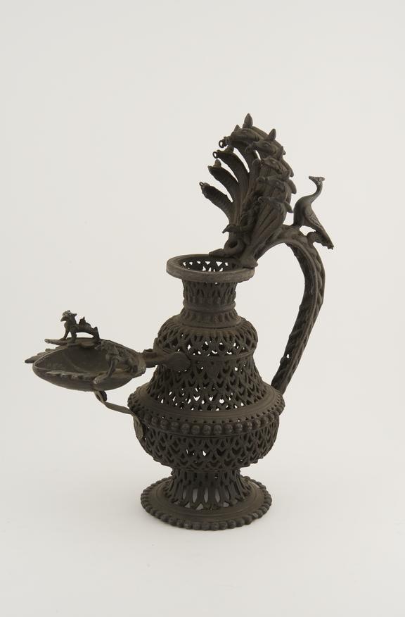 Metal incense burner with attached lamp