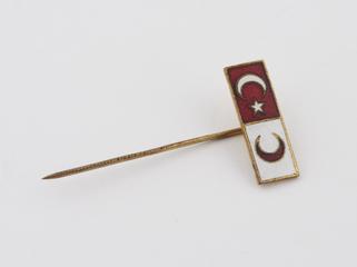 Blood donor badge with red and white star and moons