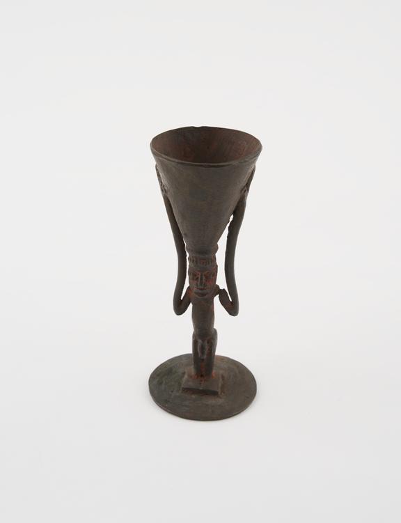 Poison cup, bronze, in form of male figure, made