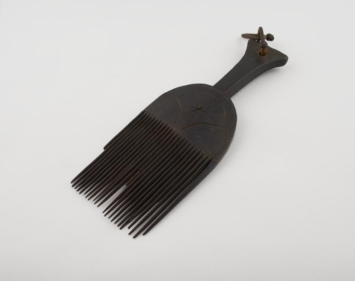 Carved wooden hair comb