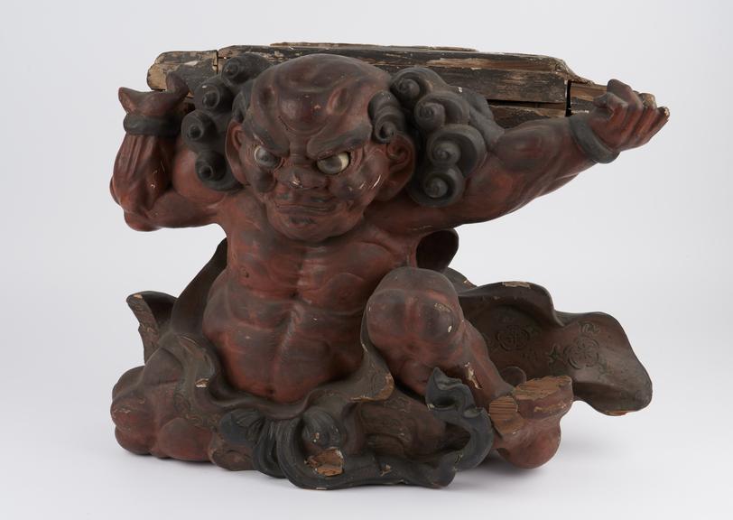 Chinese carved wooden demon, possibly from the eaves of a temple