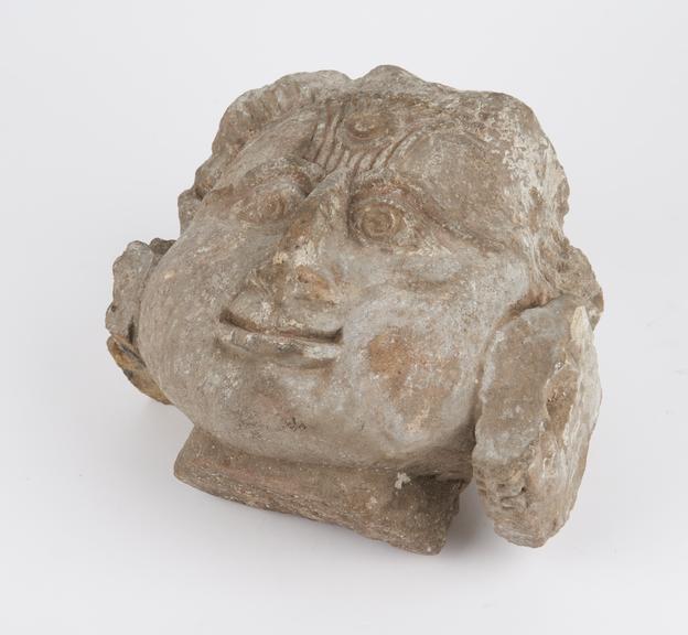 Sandstone head, possibly of a demon