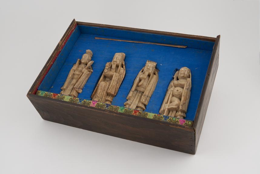 Box containing four Chinese soapstone figures, unsigned