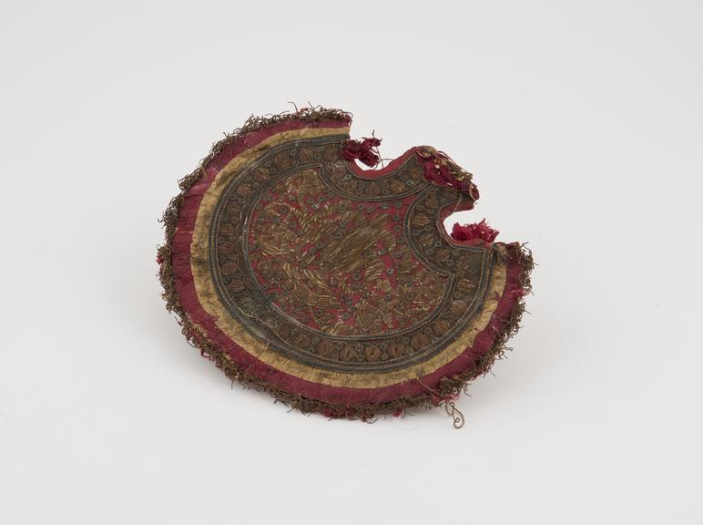 Decorative fan shaped textile covered object