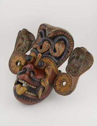 Polychrome devil mask from Kolam performance
