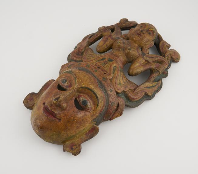 Painted face mask from Kolam play