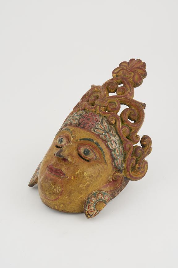 Painted wooden face-mask, polychrome