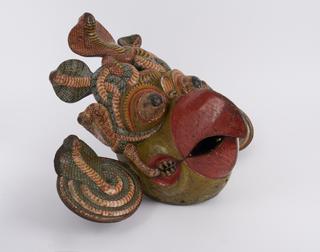 Polychrome painted mask from Kolam play