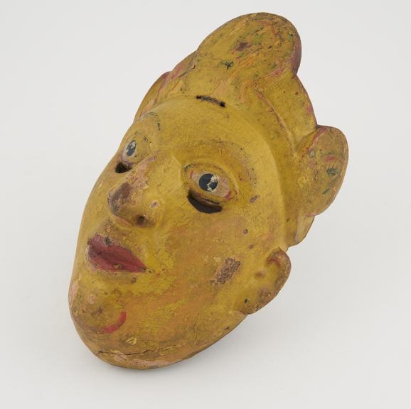 Painted wooden face mask, coarsely repainted, detail missing