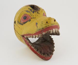 Painted mask in form of monstrous animal